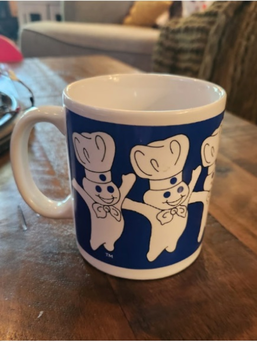 White Ceramic Mug with Blue Printed Character Design